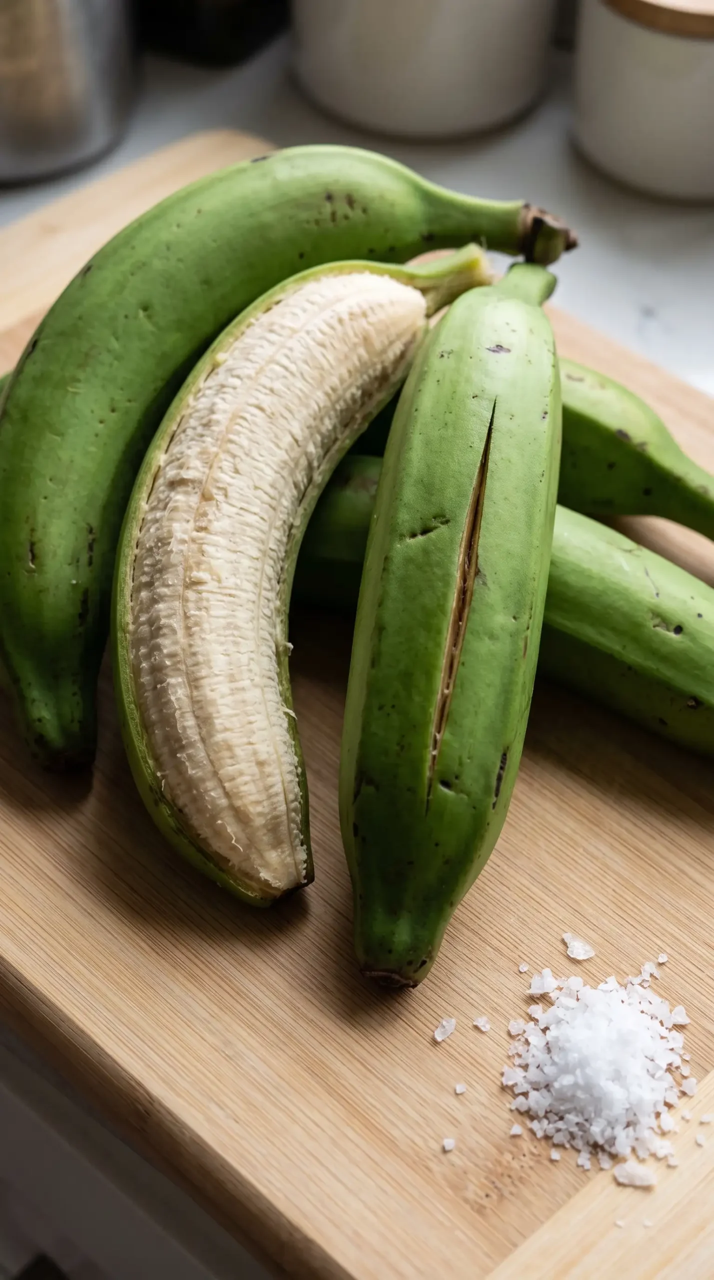 Firm green plantains showing the starchy ingredient used for making tostones